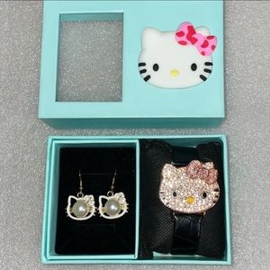 Hello kitty hinged opening face watch with black leather band and earrings.NWT